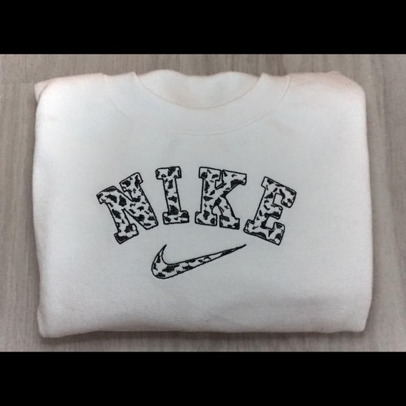 nike cow crewneck